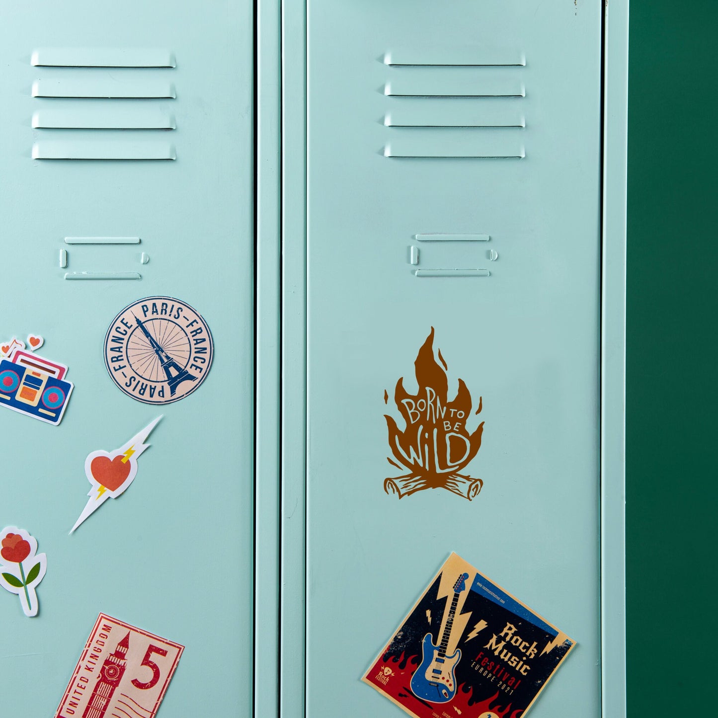 A born to be wild campfire decal stuck on a retro locker door.