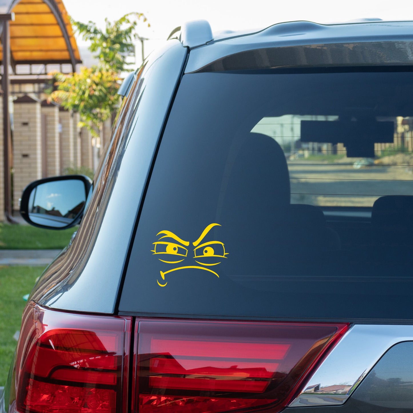 a funny grumpy face decal sticker