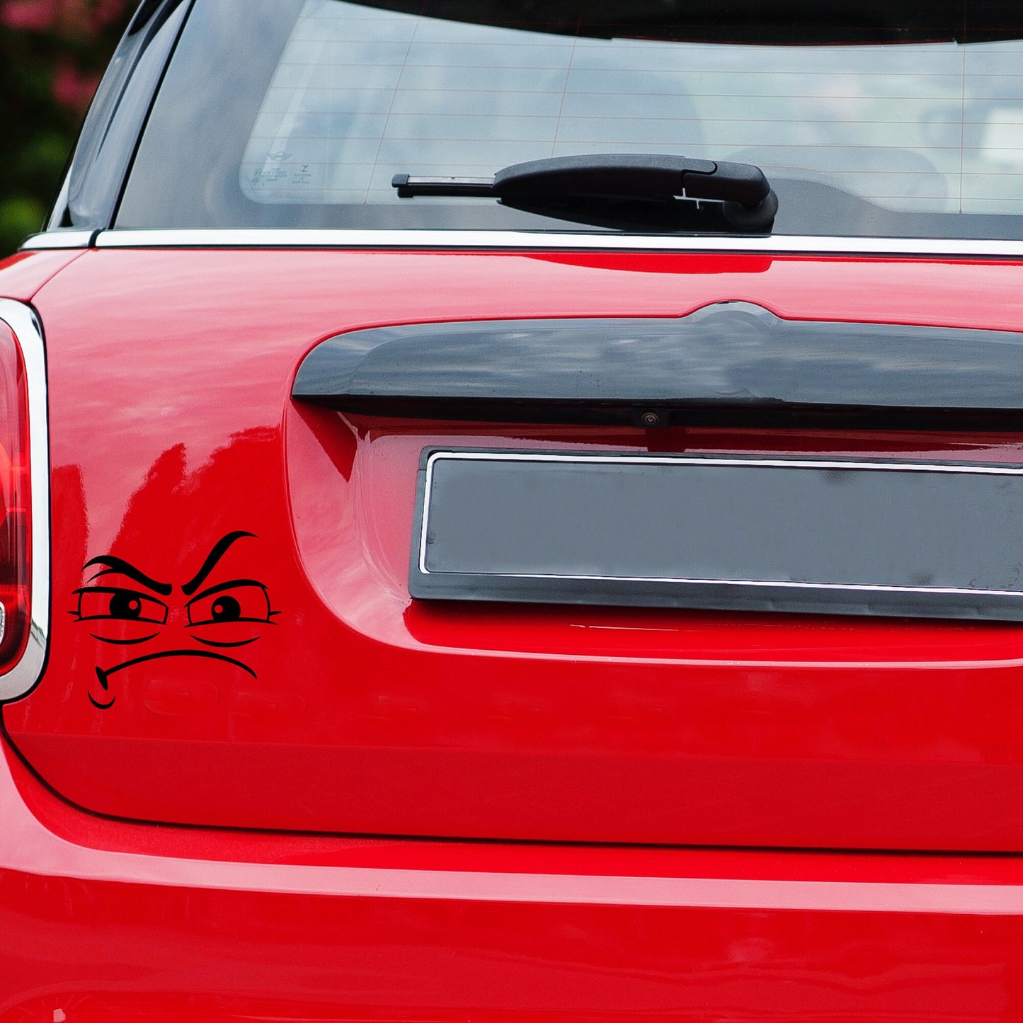 a funny grumpy face decal sticker
