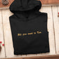 A custom embroidered text premium quality hoodie