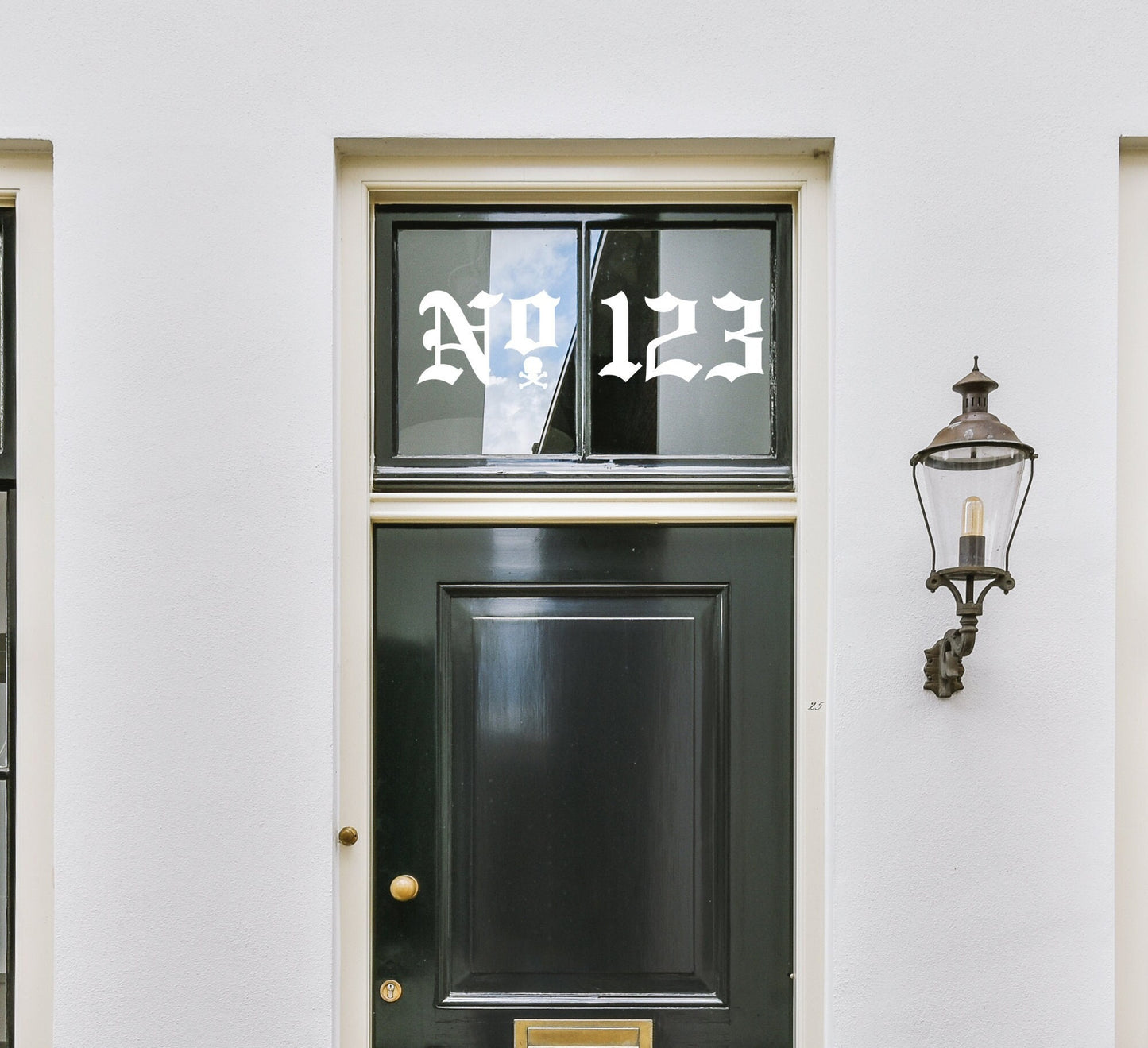 a pirate themed door number decal sticker with a skull under the "o" in place of a dot.